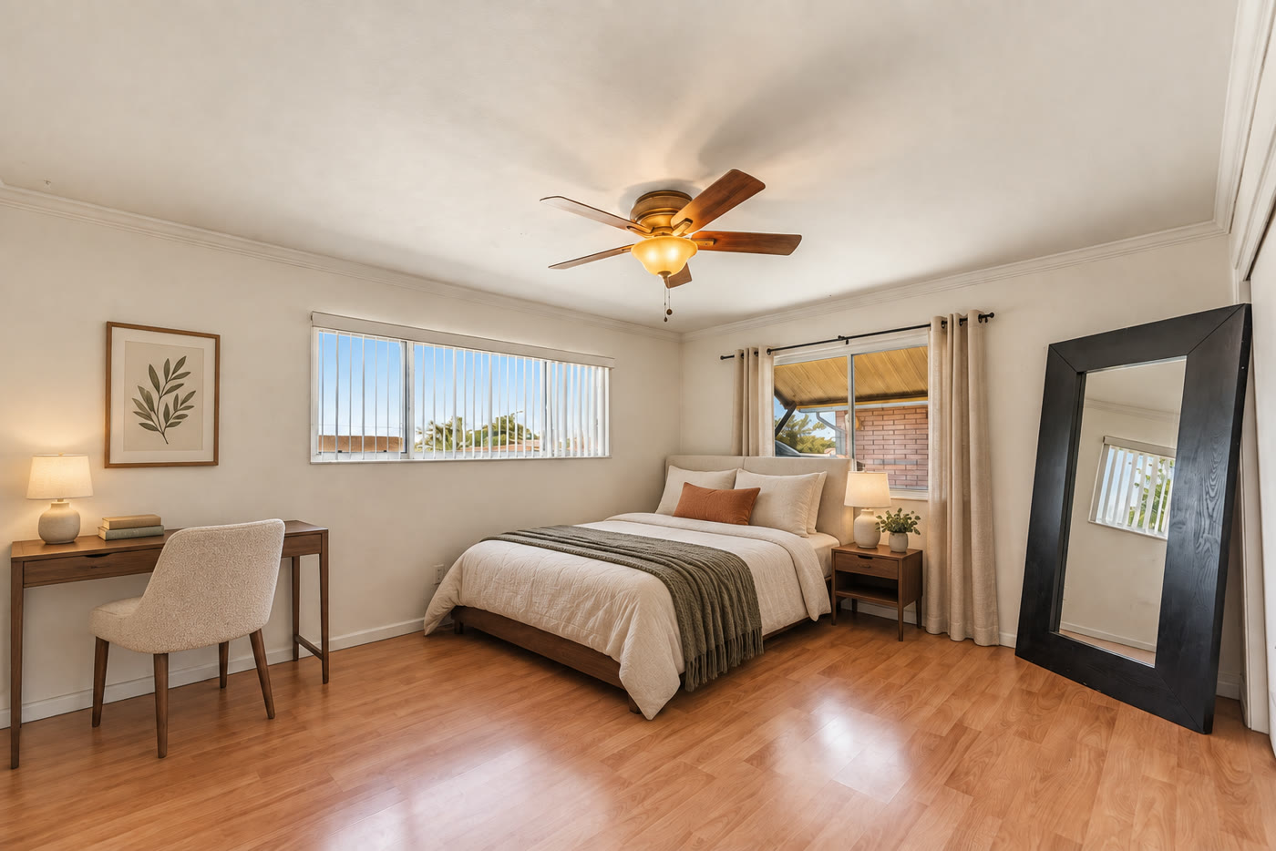Virtually staged bedroom with a bed and desk